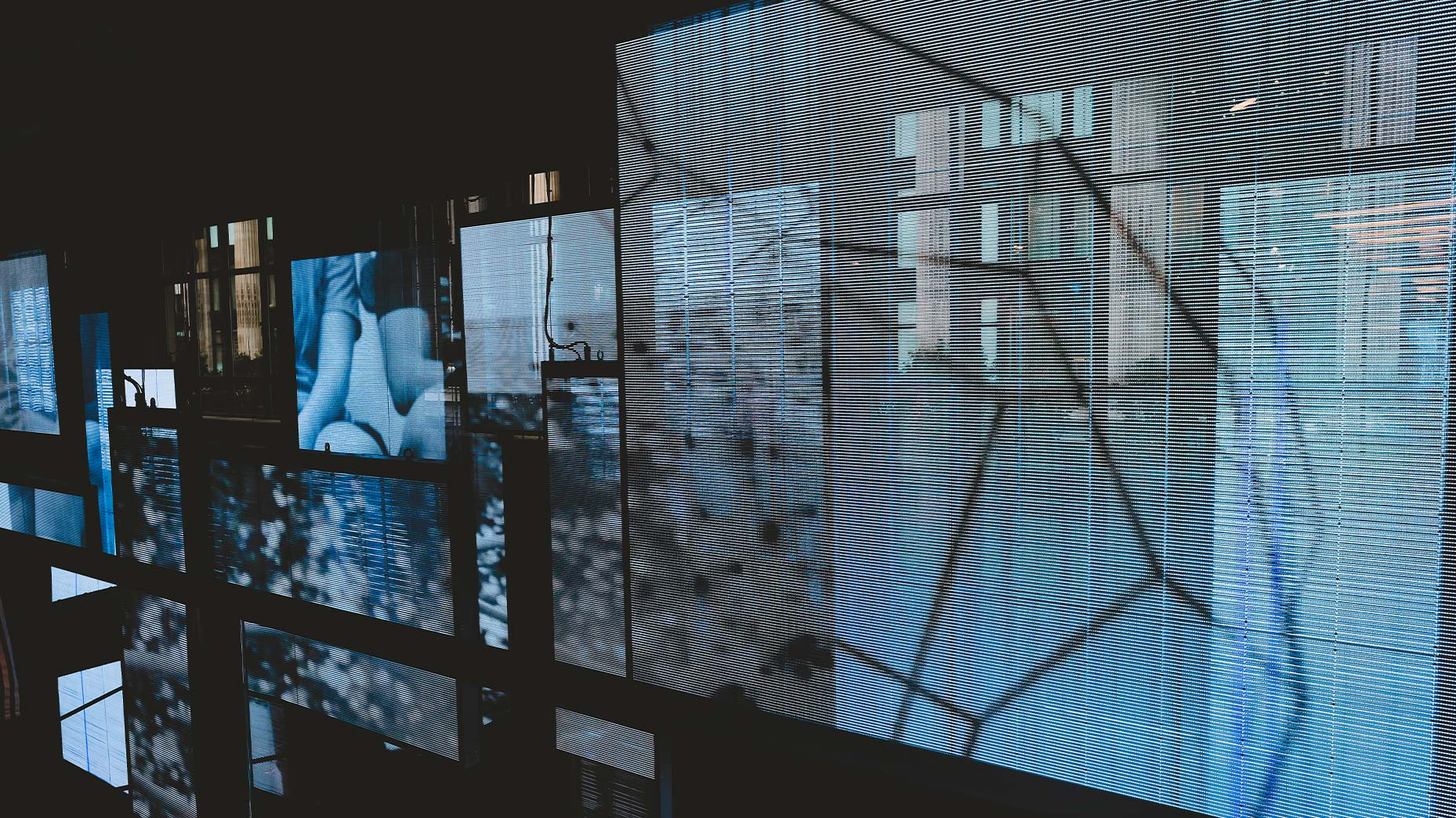 Football zone LED wall and transparent acrylic product display panels in the adidas London flagship store