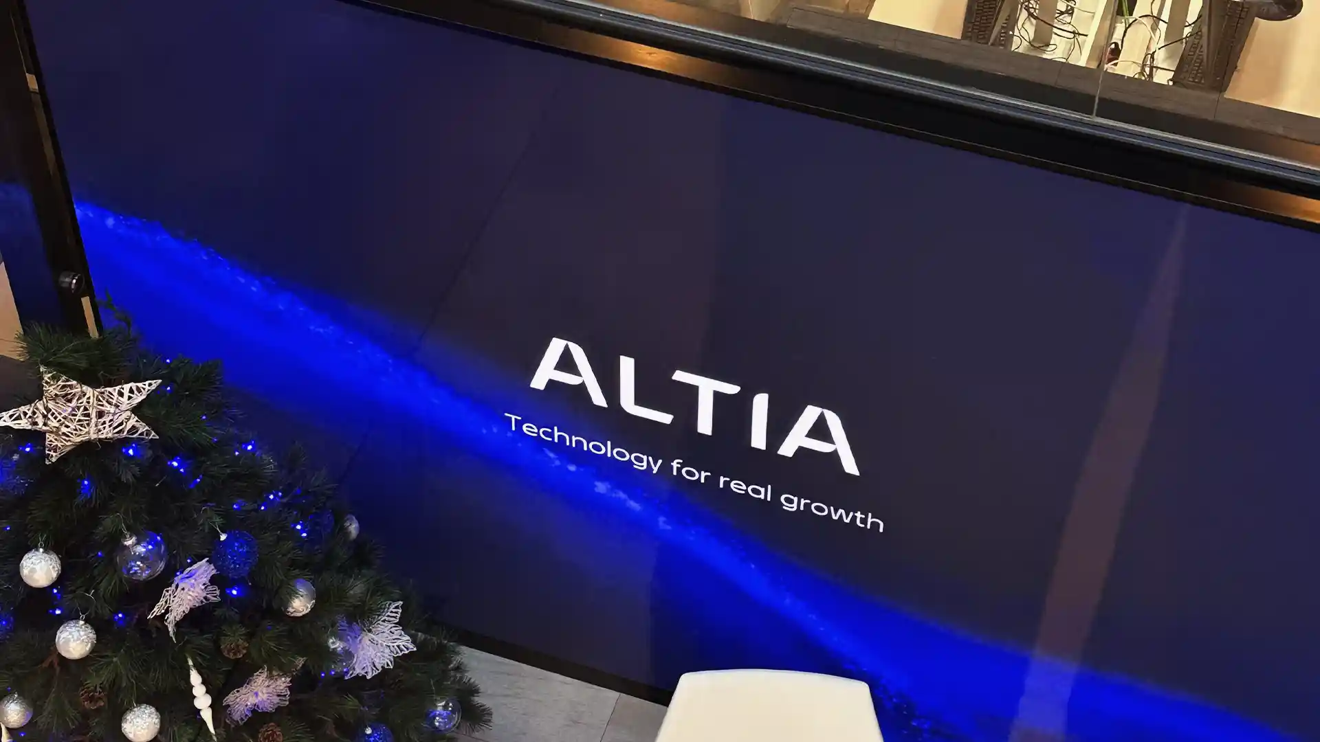 Corporate LED display at ALTIA headquarters managed through TRISON Spaces content management system.