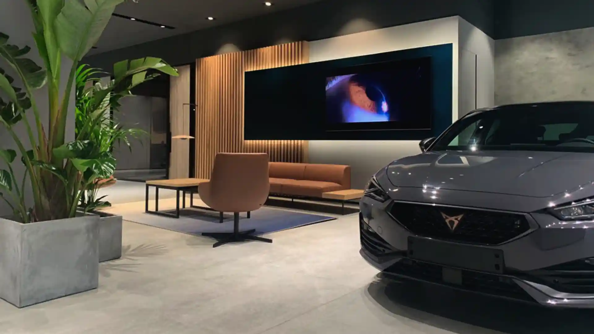 Des écrans grand format utilisés pour les événements et les moments de livraison des véhicules au CUPRA City Garage Paris
