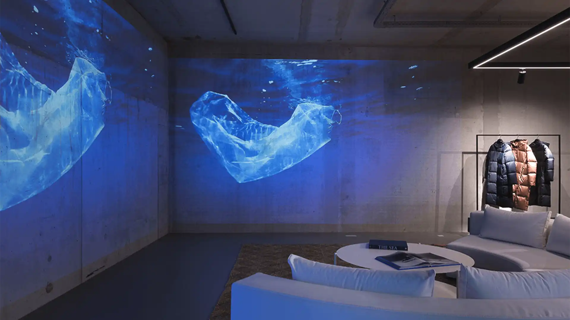 Projection marine immersive intégrée dans le magasin phare d'Ecoalf, renforçant l'image de marque durable.