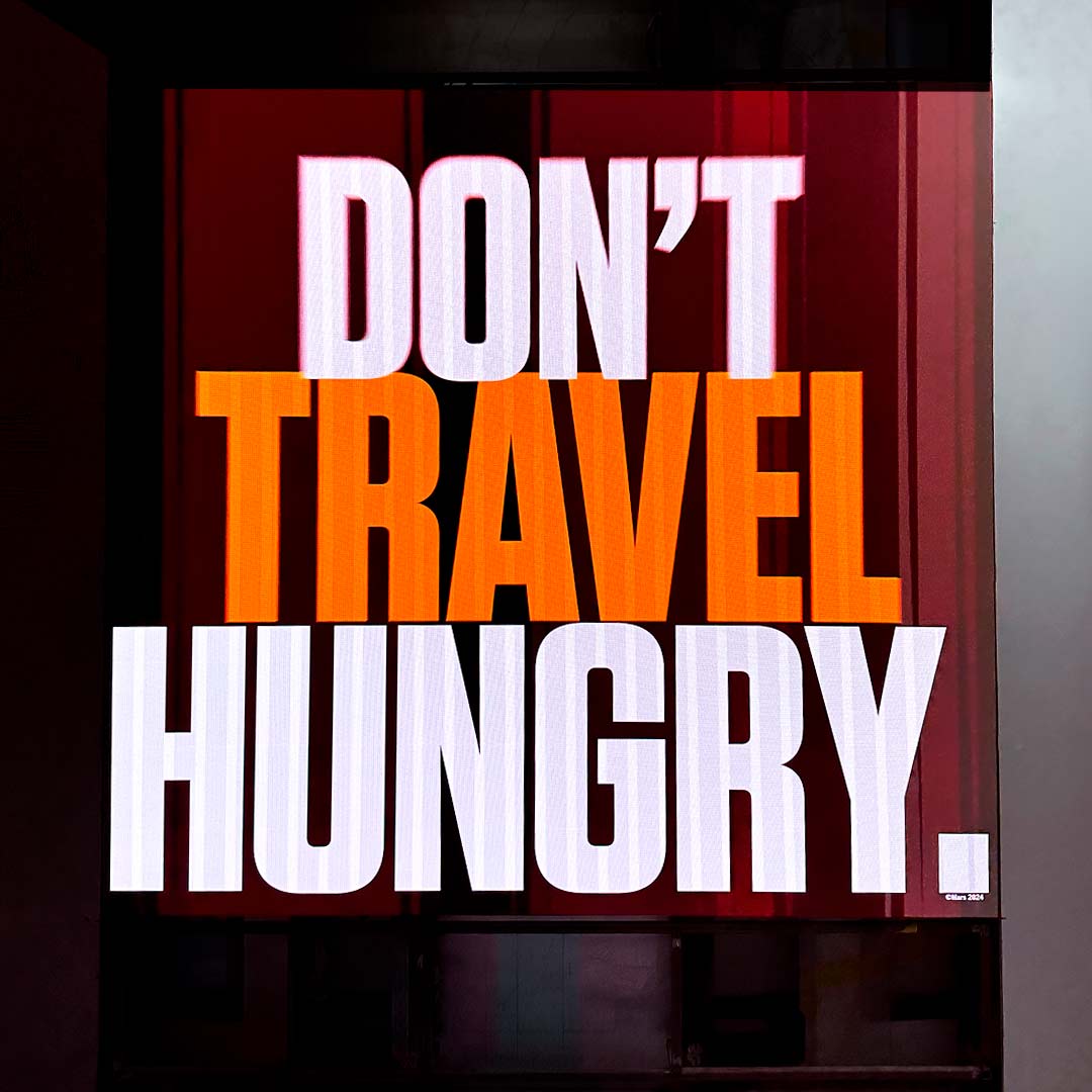 Digital signage display in food and beverage area installed by TRISON Germany on a Heinemann cruise ship