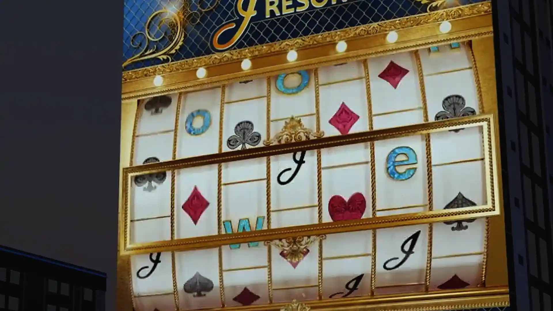 Dynamic LED animations displayed on the J Resort Casino façade during nighttime.