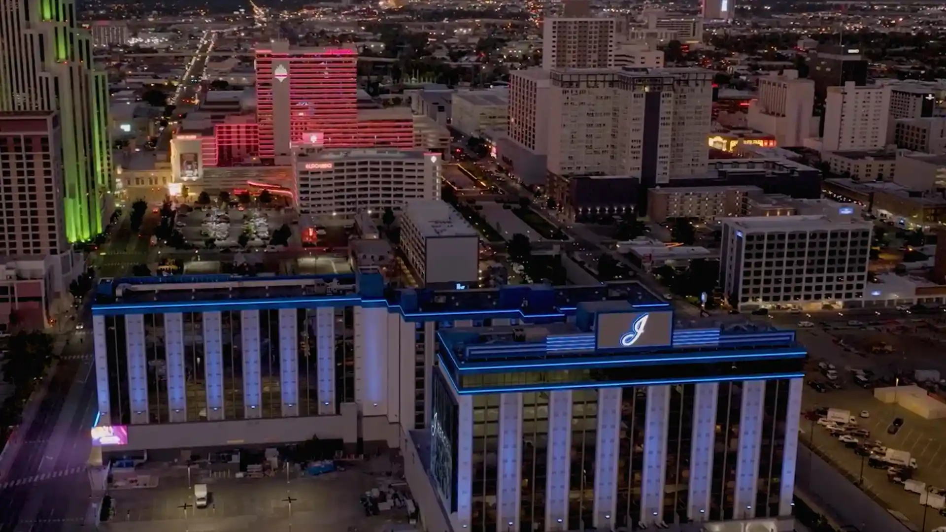 Dynamic LED animations displayed on the J Resort Casino façade during nighttime.