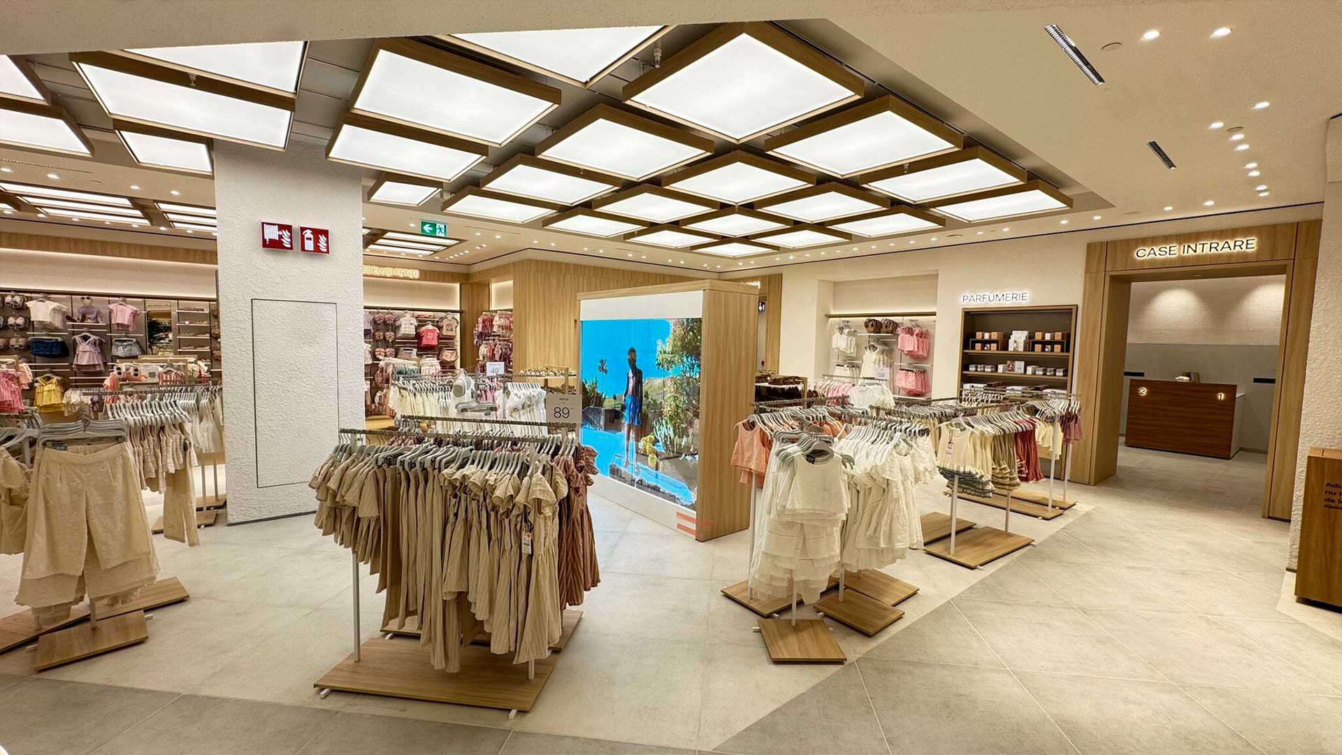 Transparent LED glass display unit integrated into the kids area of Lefties Bucharest store