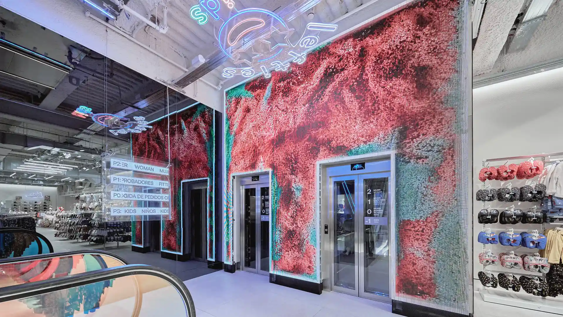 Interactive and immersive retail environment inside Lefties with multi-surface digital activations.