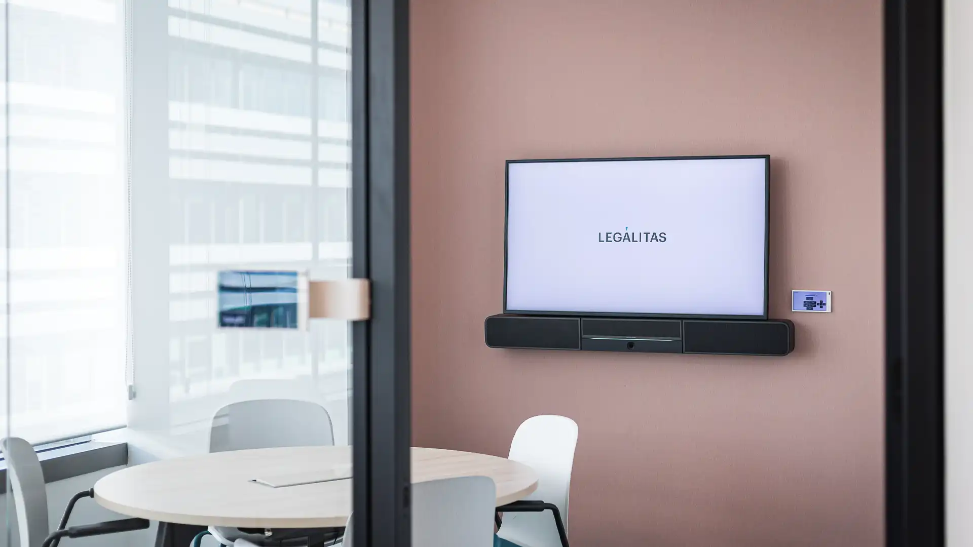 Wide shot of Legalitas’ corporate headquarters in Madrid featuring LED displays and integrated audiovisual systems by TRISON