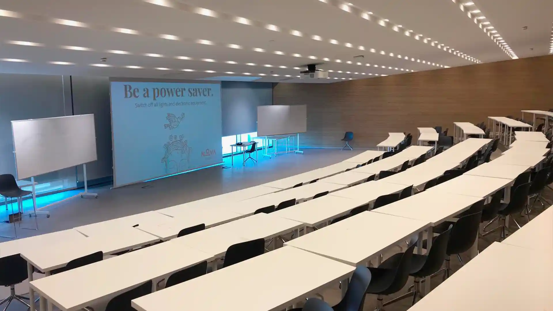 Large-format LED screen integrated in Nova SBE atrium for events and digital signage.