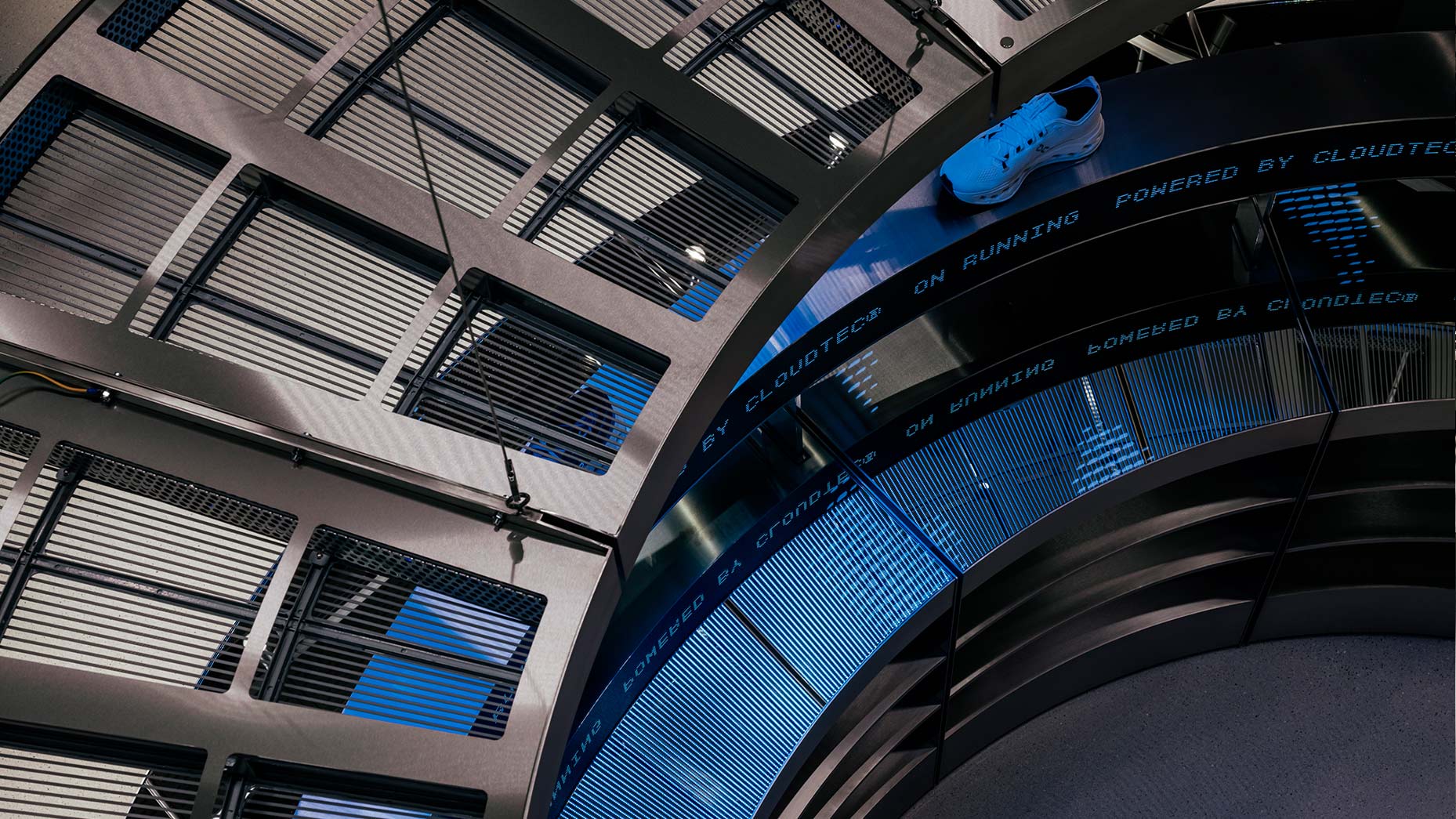 Close-up of transparent LED ceiling screen at On Running Zurich flagship store installed by TRISON