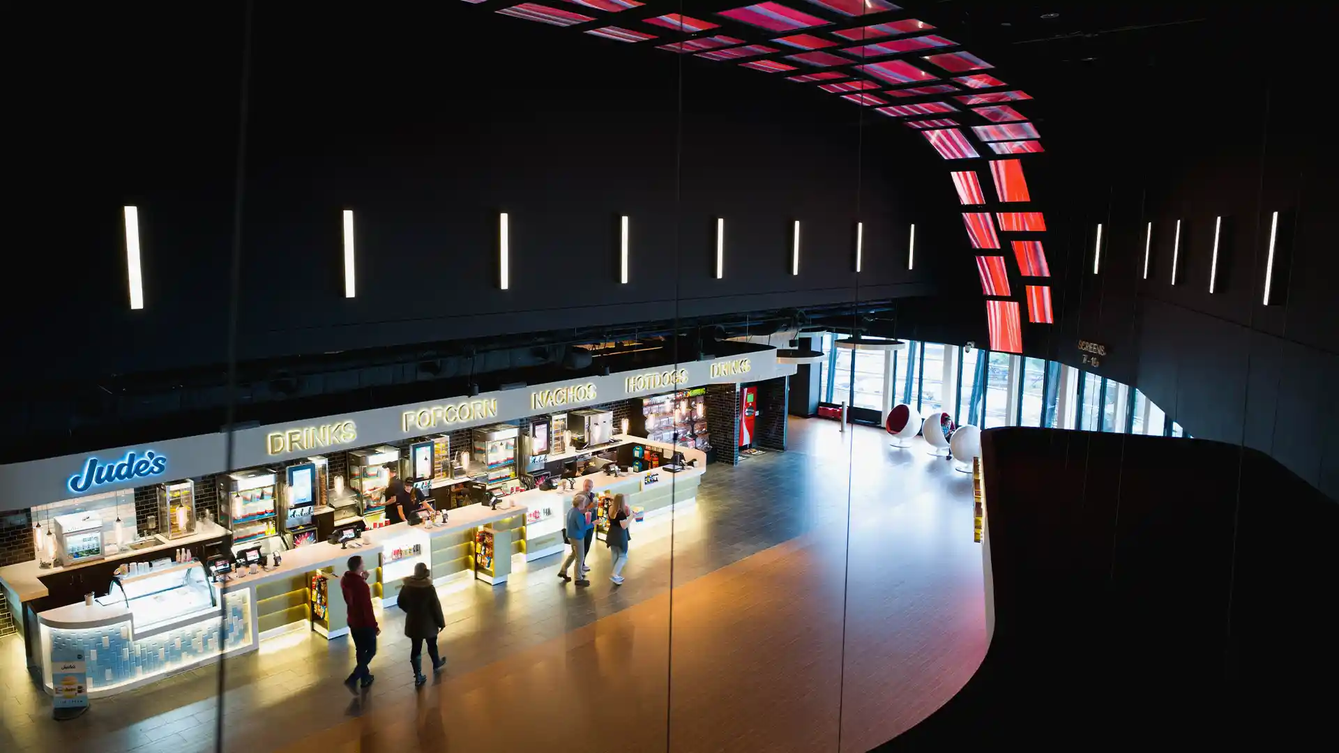 Engineering detail of the curved 40-screen digital installation, showing TRISON’s bespoke suspension and precision alignment.