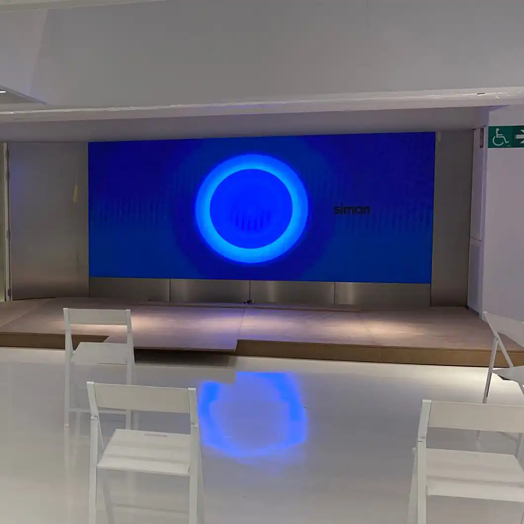 Modern auditorium at La Casa de la Luz with full audiovisual integration.