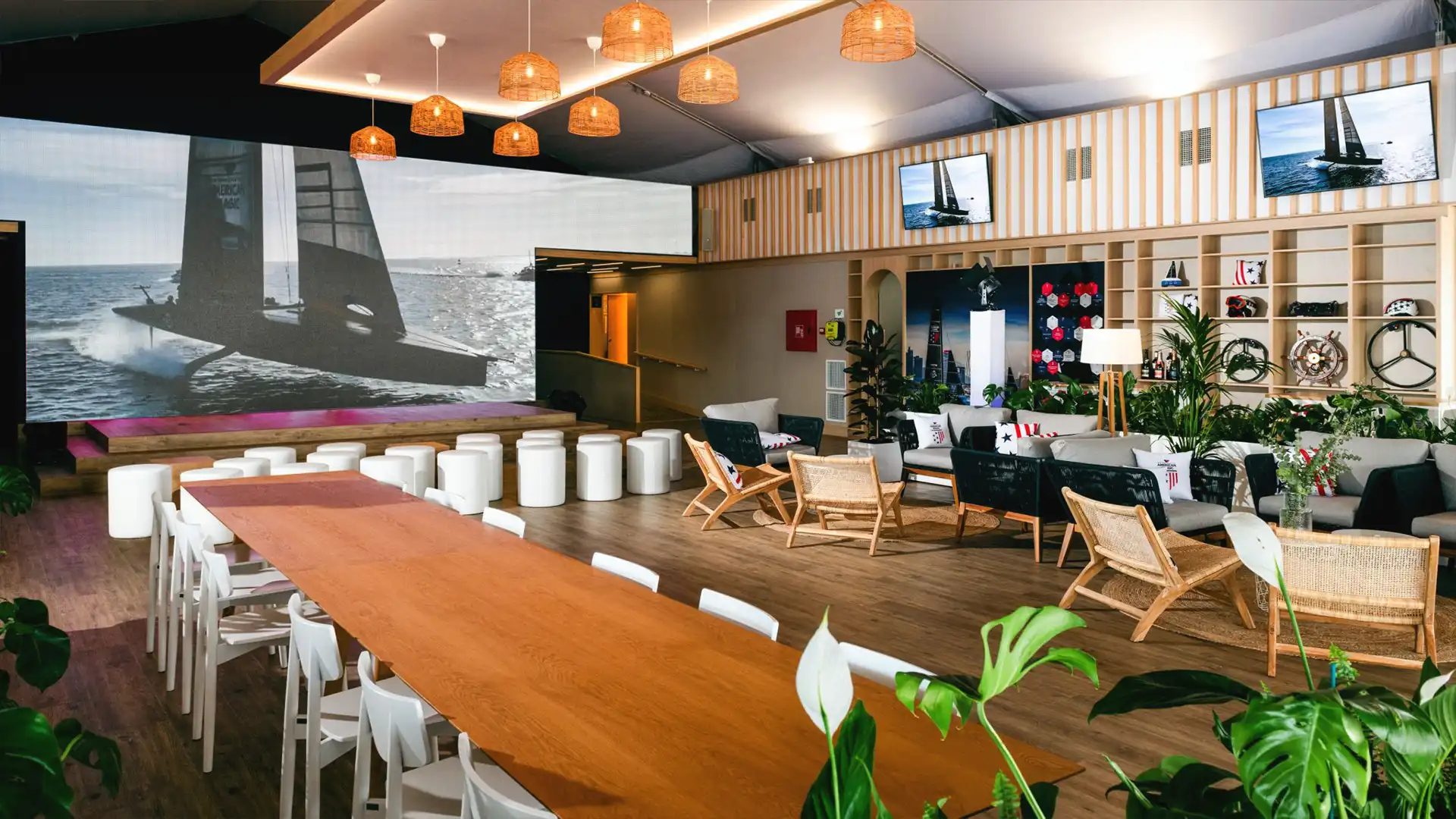 Interior view of the American Magic Team Base in Barcelona showing immersive audiovisual setup and flexible space design.