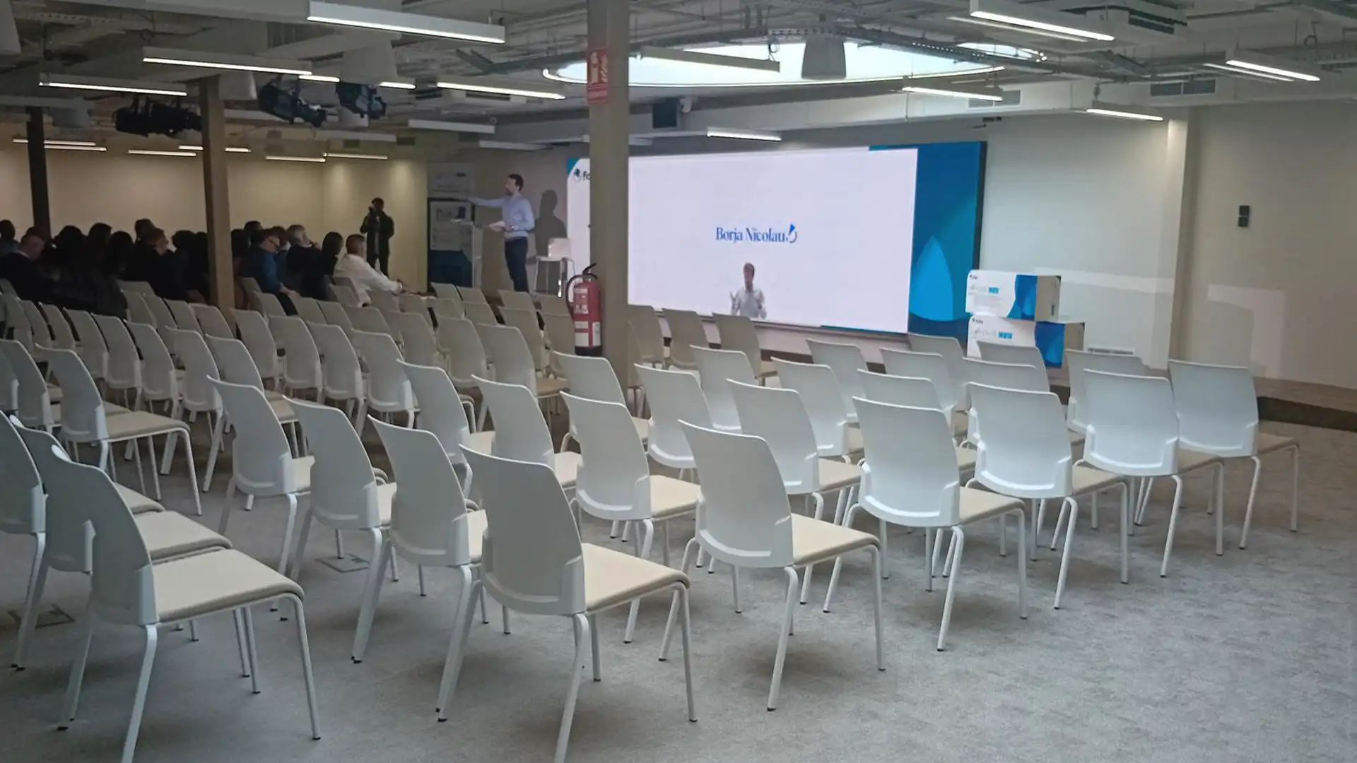 UCJC classroom equipped with interactive 86” display, audio bar, and camera for hybrid learning integrated by TRISON.