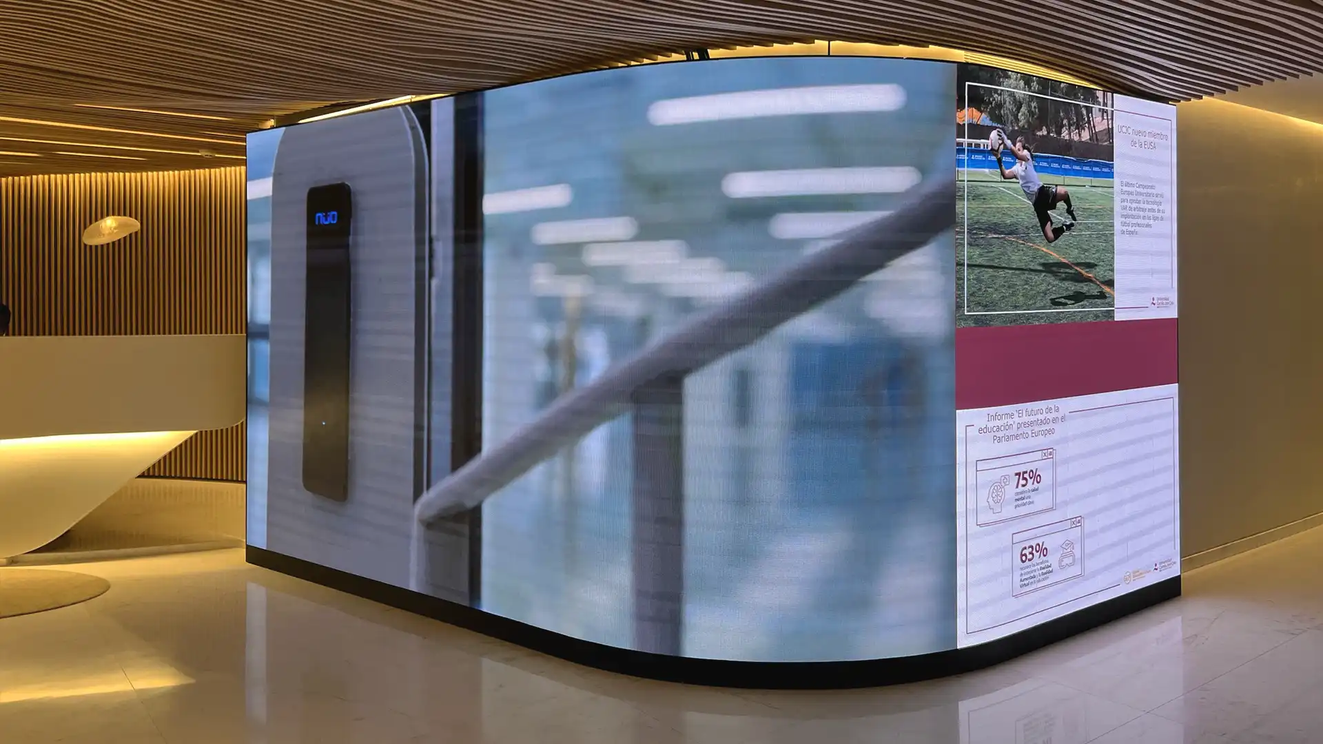 UCJC entrance featuring large LED screen and advanced audiovisual system designed by TRISON.