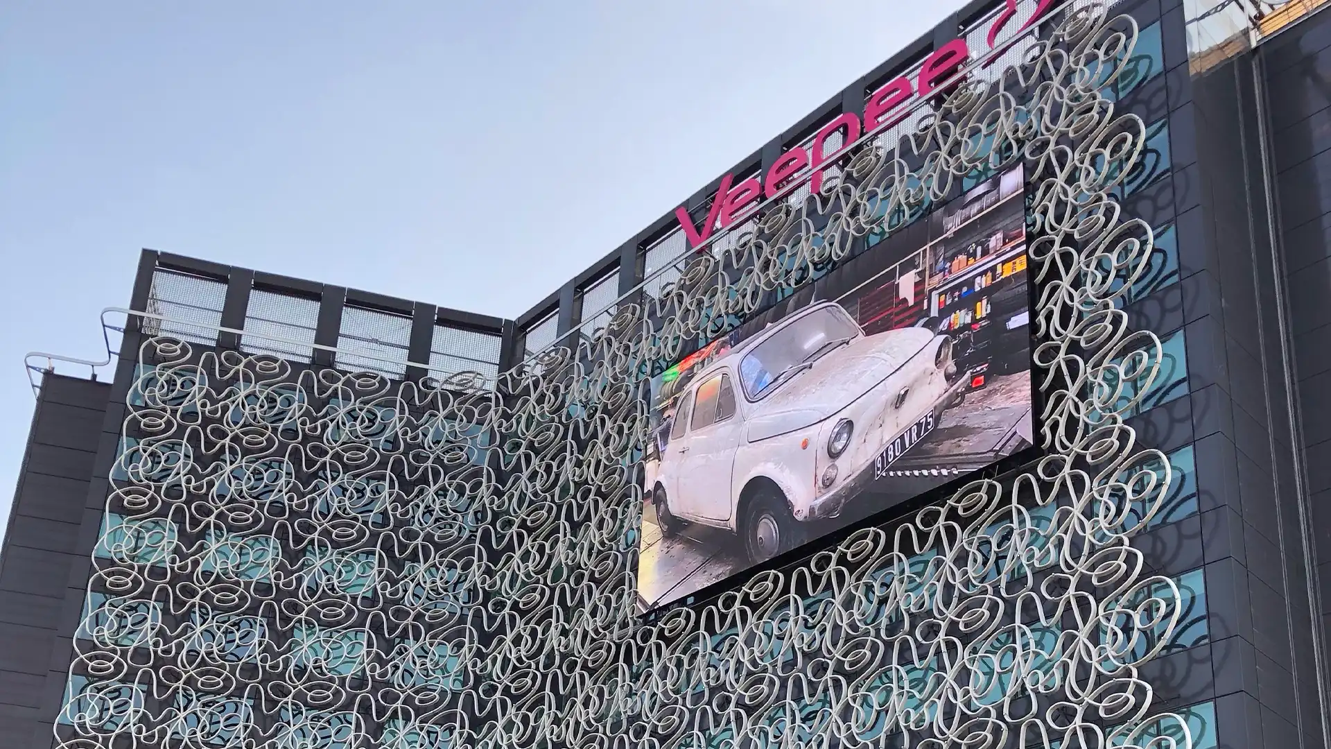 Exterior view of VEEPEE’s upgraded 100 m² outdoor LED façade in Saint-Denis.